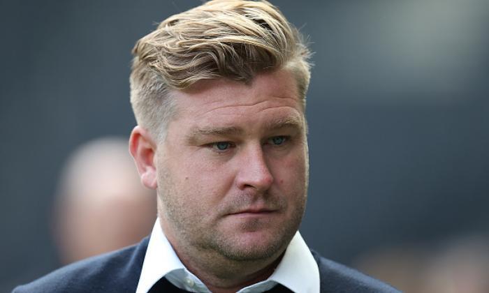 确认的：MK Dons Part Company与Manager Karl Robinson