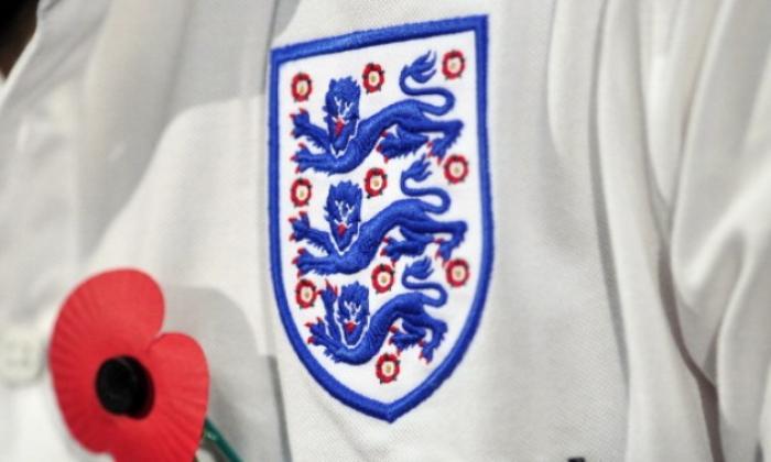 Theresa可能会抨击FIFA，以“完全无耻”决定禁止英格兰和苏格兰球员穿罂粟花