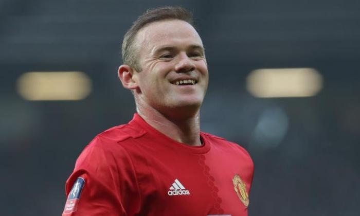 Wayne Rooney'快乐和致力于曼联曼联联系与中国超级联赛举动