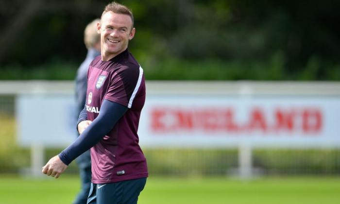 珊瑚日期下载 -  Wayne Rooney为纪录排名第50次英格兰的目标而对抗瑞士