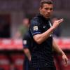 阿森纳的Lukas Podolski在意大利'解决'，但承认他不确定未来